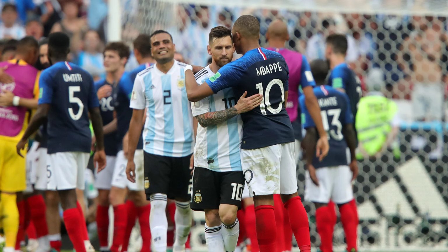 Players of Argentina and France battling on the field