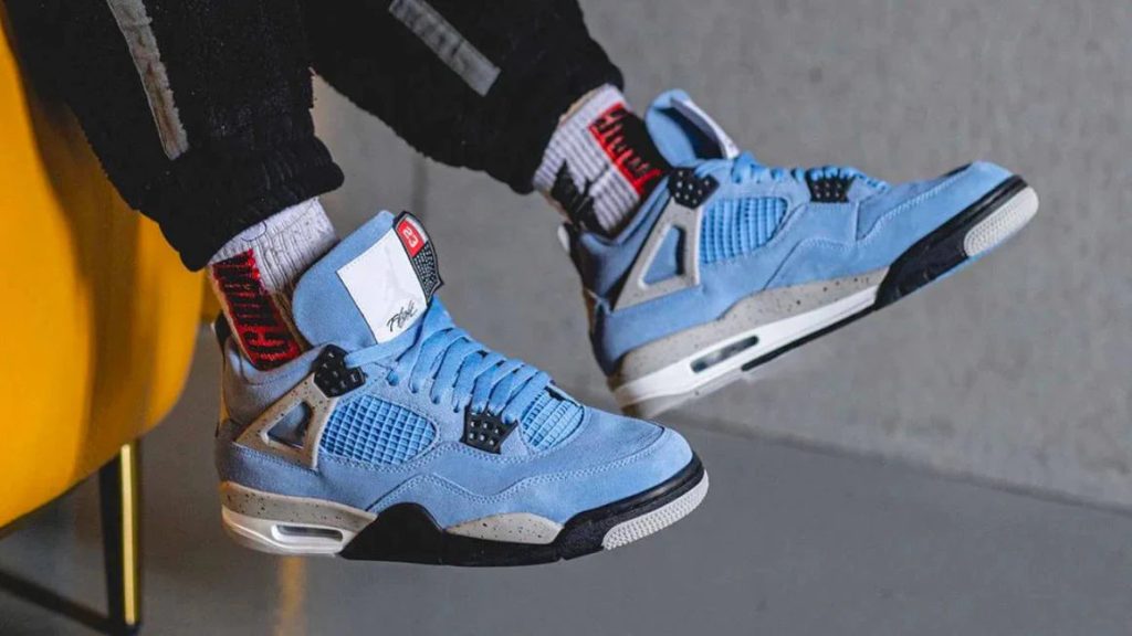 Close-up of the University Blue Jordan 4 sneaker design