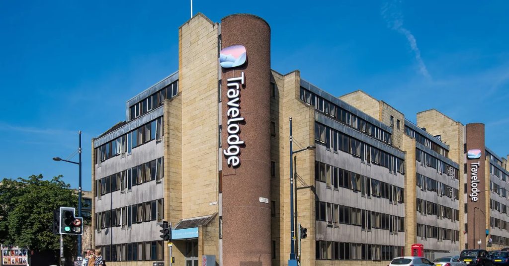 Front view of Travelodge Edinburgh Central Hotel during sunset