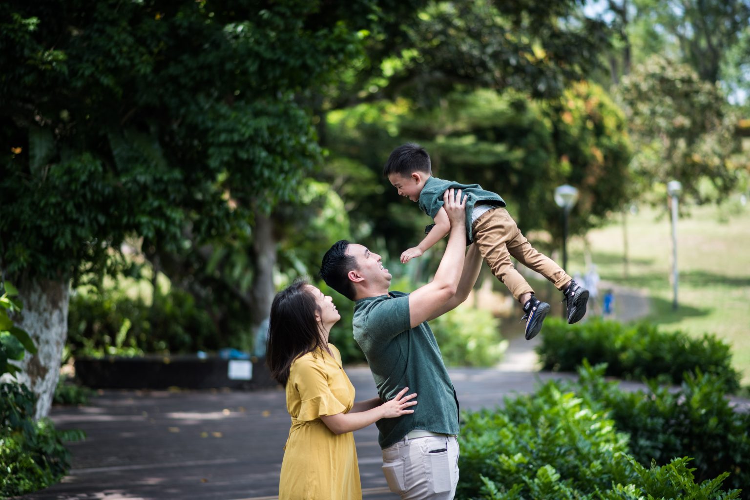 More than a carrier: The rise of stylish baby wearing Parent using a stylish baby carrier while walking outdoors